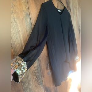 Black, long sleeve blouse with gold sequins